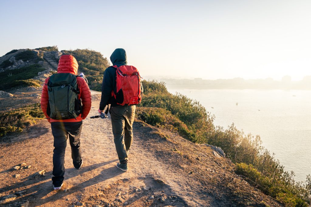 Gonzalo Manera and Alexander Gendron hiking in Portugal with two Ajna