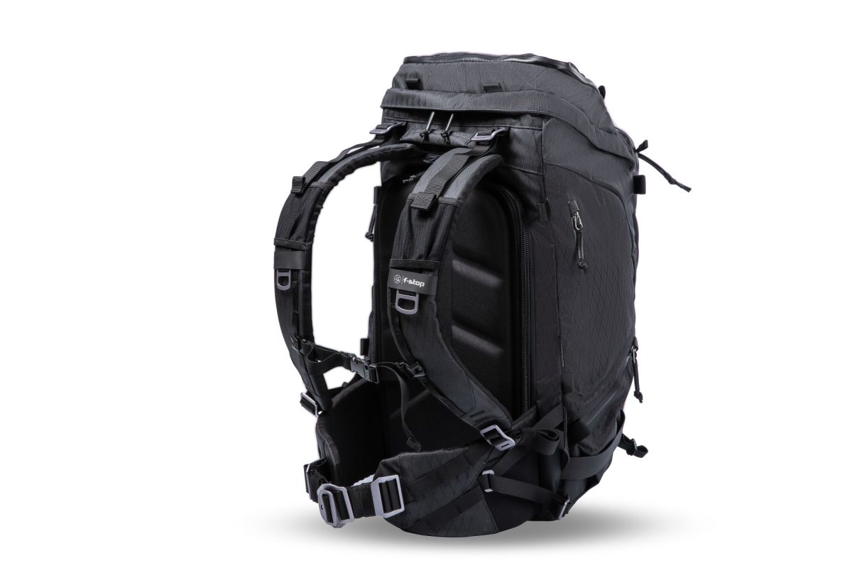 f-stop Tilopa 50 liter DuraDiamond® camera backpack in the Anthracite Black color option viewed from the side and back