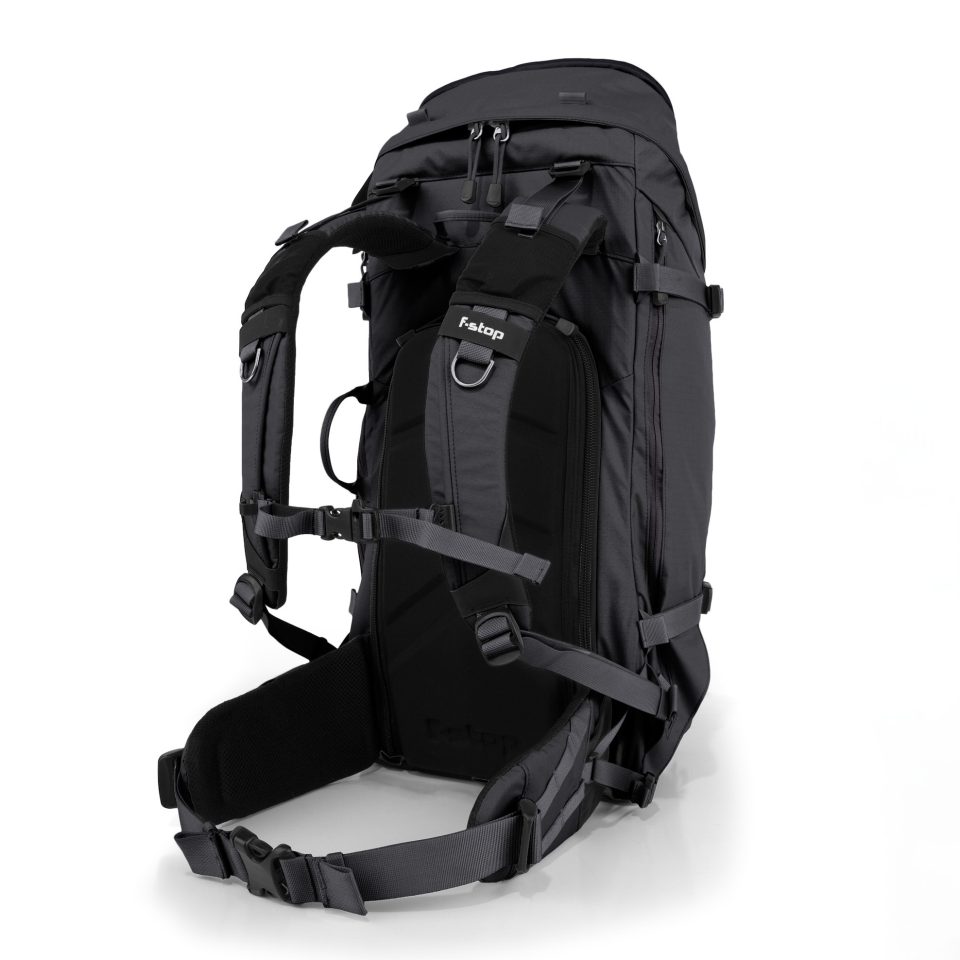 f-stop Sukha 70 liter camera backpack in the Anthracite Black color viewed from the side and back