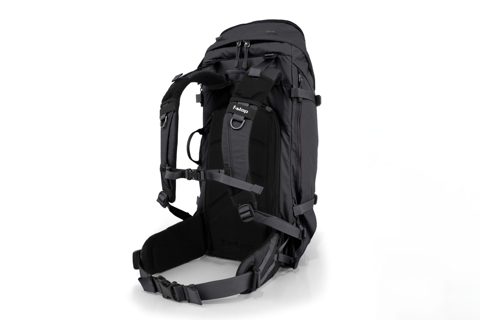 f-stop Sukha 70 liter camera backpack in the Anthracite Black color viewed from the side and back