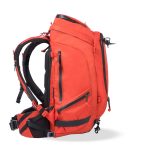 f-stop Tilopa 50 liter DuraDiamond® camera backpack in the Magma Red color option viewed from the side